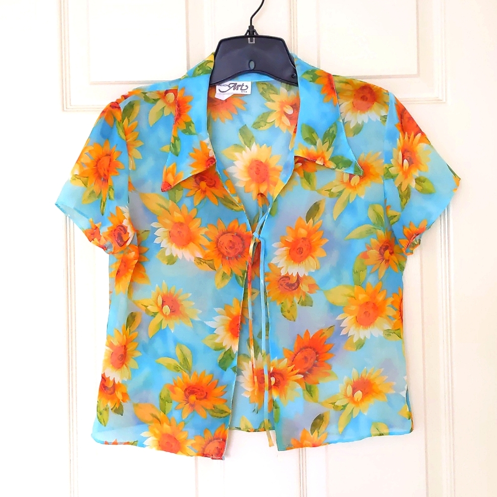 Short Sleeve Sheer Shirt with bright and colorful sunflowers and front tie.